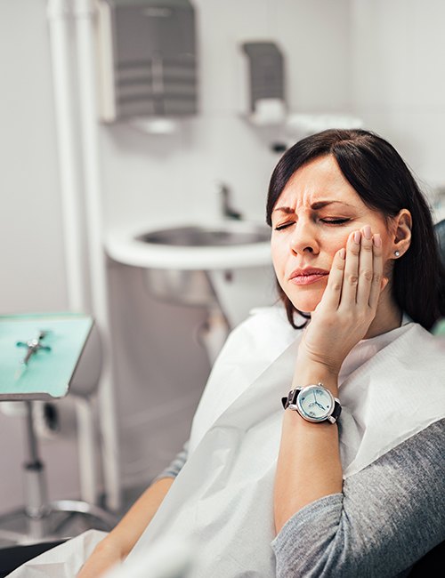 Woman at the dentist with a toothache